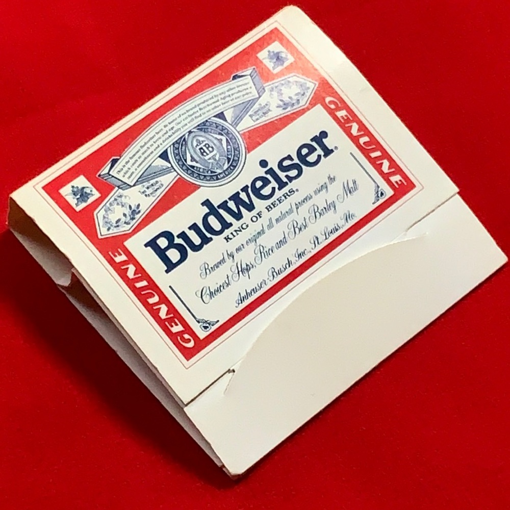Vintage Budweiser golf tees and ball marker inside match book. So cool!